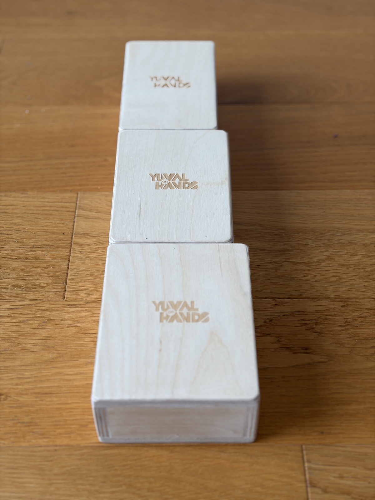 Three handstand blocks — small, medium and large